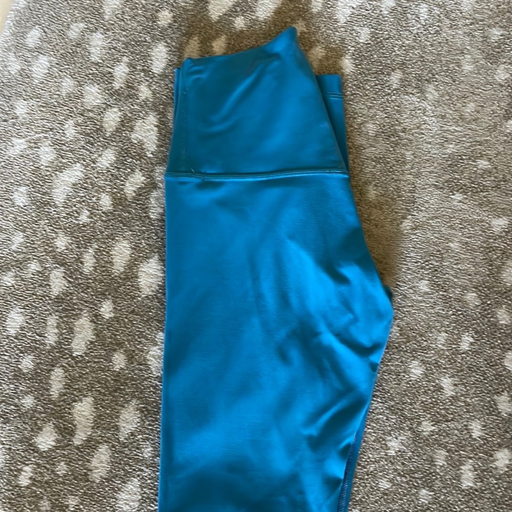 Blue lululemon 25”winder under leggings.